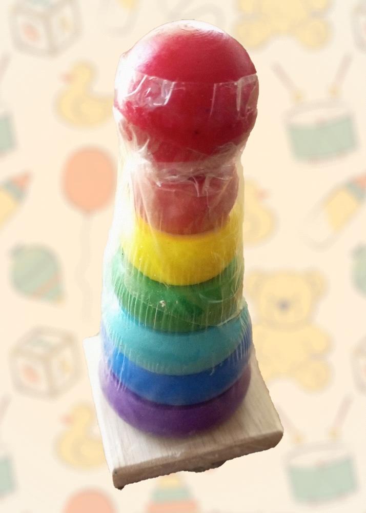 Introduce your child to the timeless fun of stacking and sorting with this adorable rainbow stacking ring toy. Each ring is a vibrant color, perfect for teaching color recognition and fine motor skills.

The stacking rings are complete and in excellent condition, making them a wonderful addition to any child toy collection. 

Order today and bring the joy of this vintage toy into your child life!